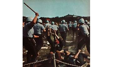 Cops Beating Down On Hippie Scum At The 1968 Democratic National Convention en Lyrics [Negative XP]