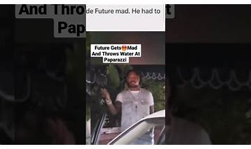Future threatens paparazzi and throws water on him 